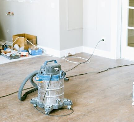 Dogs barking at vacuum cleaner