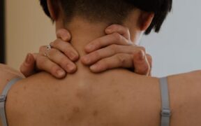 Dog sensitive skin along spine symptoms