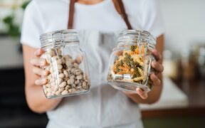 Cats showing defensive posture around food storage areas
