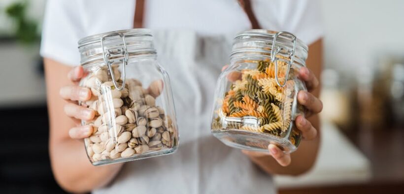 Cats showing defensive posture around food storage areas