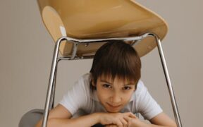 Can parasite medication cause hiding under furniture