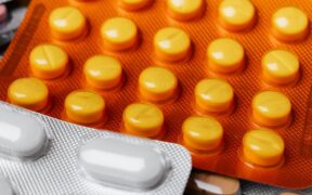 Should parasite medication be stopped if side effects occur